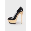 High-heeled patent leather shoes