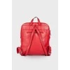 Red backpack with silver hardware