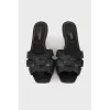 Black leather slippers