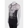 Black and white t-shirt decorated with rhinestones