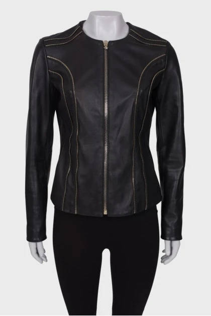 Leather jacket decorated with zippers