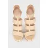 Beige sandals with elastic bands