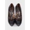 Black patent leather stilettos