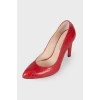 Red snakeskin embossed shoes