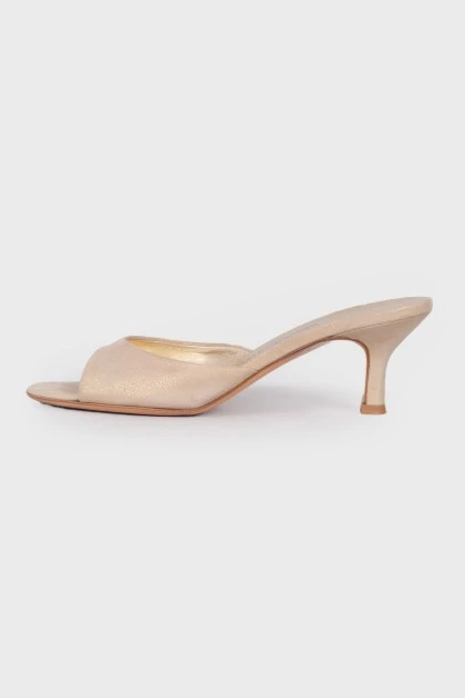 Golden mules with heels