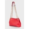 Red bag with gold keychain