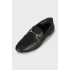 Leather loafers with gold trim