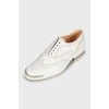 White leather brogues