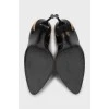 Black patent leather stiletto heels