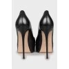 Black pointed toe shoes