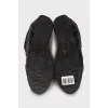 Black embossed sneakers