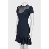 Navy blue dress with a frill at the hem