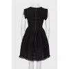 Black dress with a pattern and frills