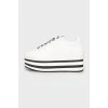 Black and white platform sneakers
