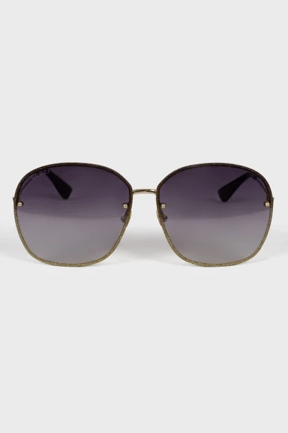 Sunglasses with glitter embellished frames