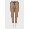 Golden trousers in cotton and linen