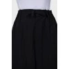Black trousers with drawstring bottom