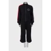 Black tracksuit with tag