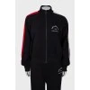 Black tracksuit with tag