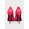 Pink pointed toe pumps