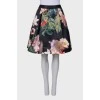 Suit with floral print skirt