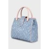 Quilted denim bag with tag