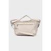 Beige perforated leather bag