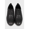 Black leather brogues
