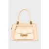 Beige bag with gold hardware
