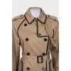 Two-tone trench coat at the waist