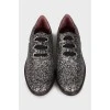 Silver lace-up shoes