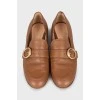 Leather loafers with golden buckle
