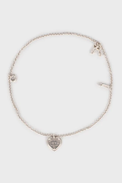 Silver bracelet with charms
