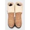Suede ankle boots with fur heel