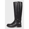Black leather boots with zipper