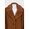 Straight-cut brown fur coat