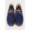 Blue lace-up shoes