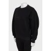 Black oversized sweatshirt with tag