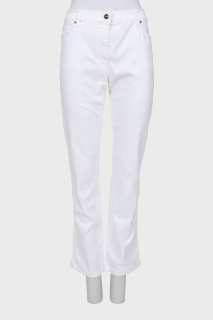 White jeans with gold hardware