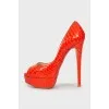 Red snakeskin shoes