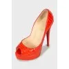 Red snakeskin shoes