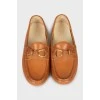 Leather loafers with gold hardware
