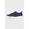 Navy blue sneakers with logo