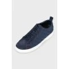 Navy blue sneakers with logo