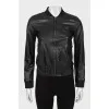 Black leather jacket with silver hardware
