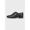 Leather black brogues