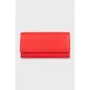 Red wallet with logo