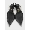 Black and white slingbacks with metallic toe cap 