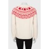 Milky sweater with red pattern