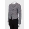 Fitted jacket with bias fastening